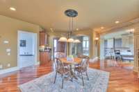 Game table/pool table or just a playroom for the kids is large, has a drink station and bar seating