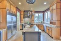 Large gourmet kitchen with all the big name appliances. Tons of cabinets and a pantry