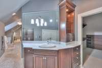 Second vanity with lots of storage on the left side and large closet