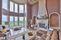 Two story fireplace and windows