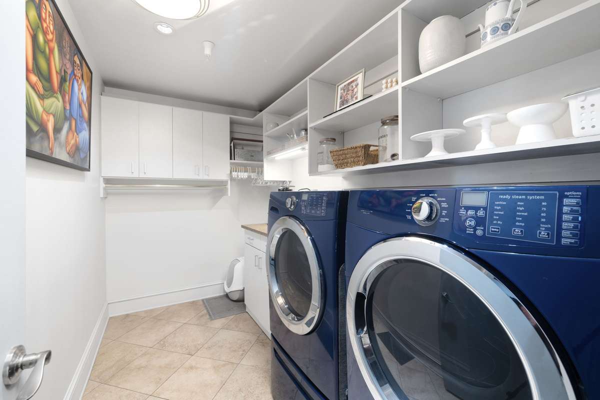 Large laundry and holds full size washer and dryer.  Lots of storage and built in space.