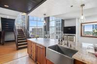 Equipped with farmer's stainless sink and gorgeous countertops.