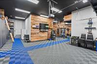 Climate controlled 4 car tandem garage. Every guys dream can come true here! I love this whole thing!