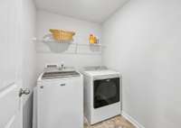 Laundry room is located upstairs near the primary suite. The Maytag washer and dryer remain with the home.