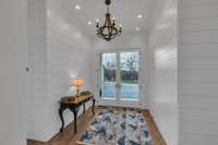 Foyer to additional flex rooms