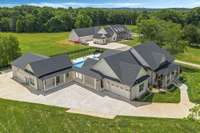 Plenty of parking on oversized concrete driveway