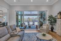 Double sliding door to covered and screened patio