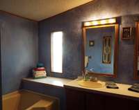 Primary bedroom has ensuite bath vanity with double sinks, garden tub to soak away the day and also has a separate shower!