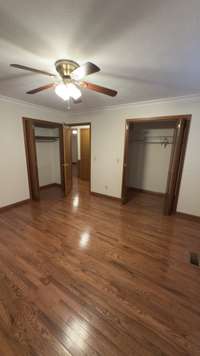 Primary Bedroom with two closets (one is a walk-in closet)