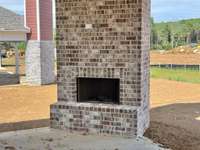 Who doesn't love a brick fireplace?