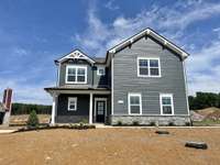 Great looking deep grey house with classic black front door