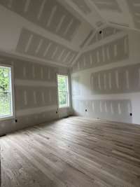 Primary suite with vaulted ceiling