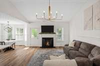 Gorgeous living room with new floors and lighting!