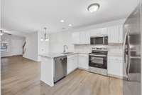 Water resistant laminate throughout kitchen