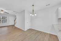 Closet under stairs, dining room