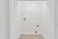 Laundry closet in upstairs hallway