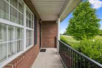 Enjoy the tranquility of country living while relaxing on the charming covered front porch! 1761 Center Hill Rd. Woodbury, TN 37190
