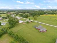 The property offers plenty of space for outdoor activities and future projects! 1761 Center Hill Rd. Woodbury, TN 37190