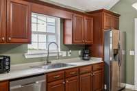 The kitchen features a large farmhouse sink- perfect for easy clean up and meal prep! 1761 Center Hill Rd. Woodbury, TN 37190