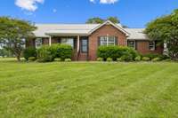 This 3-bedroom, 2-bath home features a durable 2-year-old metal roof! 1761 Center Hill Rd. Woodbury, TN 37190