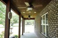 Ceiling fans and bluetooth speaker system to allow flexing on the front porch that much easier!