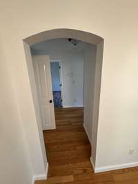 These arched entrances make this home stand out come see for yourself while this cottage. Home has some old world charm.