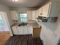 Kitchen with all white cabinets just waiting for you to come and enjoy with your family