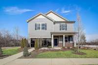 This is a photo of one of our model homes. Please know that some of the exterior and interior finishes, paints, and features may vary.