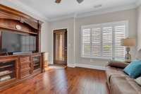 This den is tucked at the back of the home and overlooks the parklike setting of the landscape around the property!