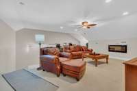 This room has countless uses!  Family room, 3rd bedroom, office - you choose!  Electric fireplace! Large walk in storage!  Full bath too!