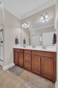 Double vanities and walk in shower in the primary bath!