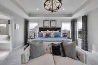 Spacious primary suite upstairs! King size furnishings shown here.