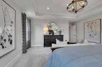 Spacious primary suite upstairs! King size furnishings shown here.