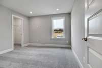 Oversized secondary bedrooms upstairs with ample storage.