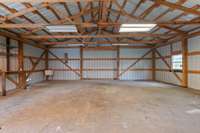 Shop has electric and plenty of work space
