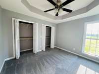 The primary bedroom has TWO separate closets