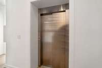 Commercial doors that I have never seen in a personal residence outside of a highrise!