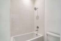 Tub with tile surround