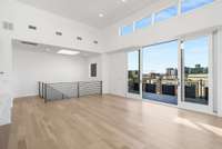 Dining space near the stairs and railing