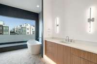 Herringbone tile and soaking tub