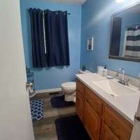 main bath with tub/shower combo