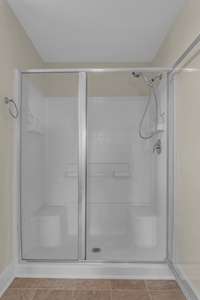 Primary bedroom walk-in shower.
