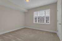 Second bedroom with a lot of natural light.