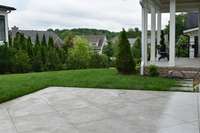 Porch off Primary bedroom with steps to backyard