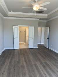 Hard surface flooring in the primary bedroom.
