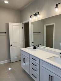 Primary bathroom looks great.