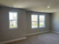 Huge upstairs bedroom with bath and walk in closet.