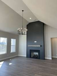 The fireplace wall is the star feature of the great room.
