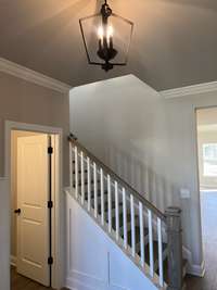 Foyer with view of stairway to second floor