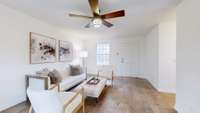 LIVING ROOM WITH WOOD FLOORING